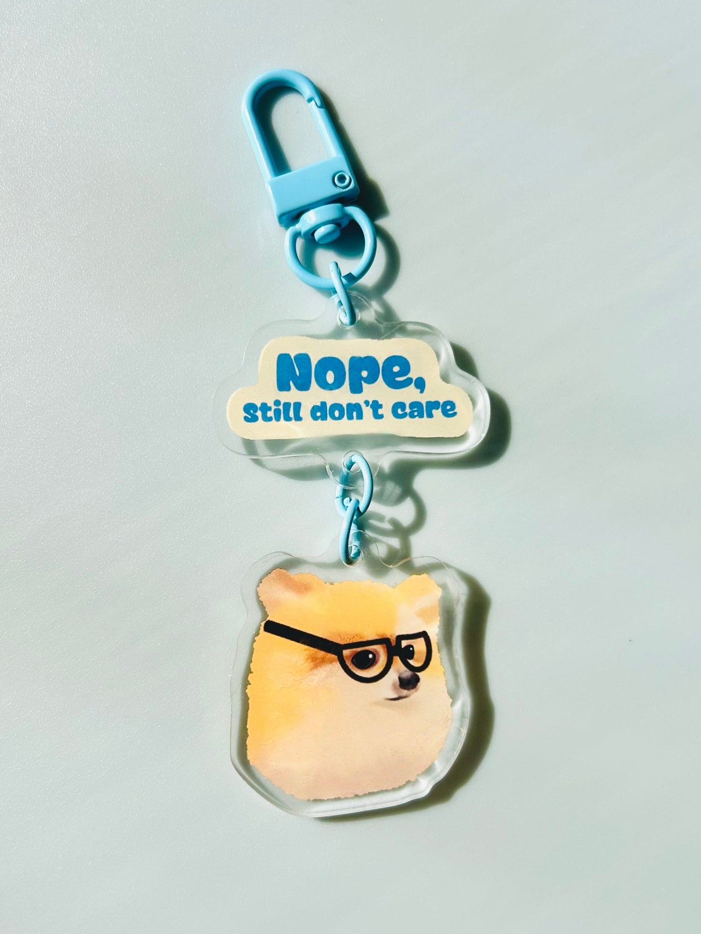 Nope, Still Don't Care Keychain